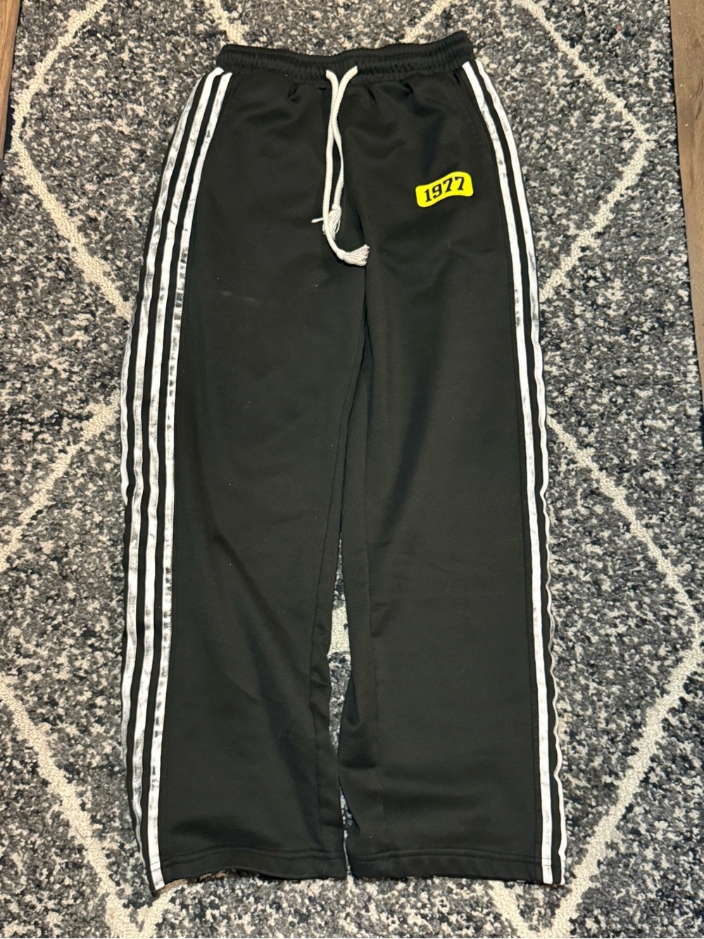 Black Track Pants with White Stripes and 1972 yellow patch